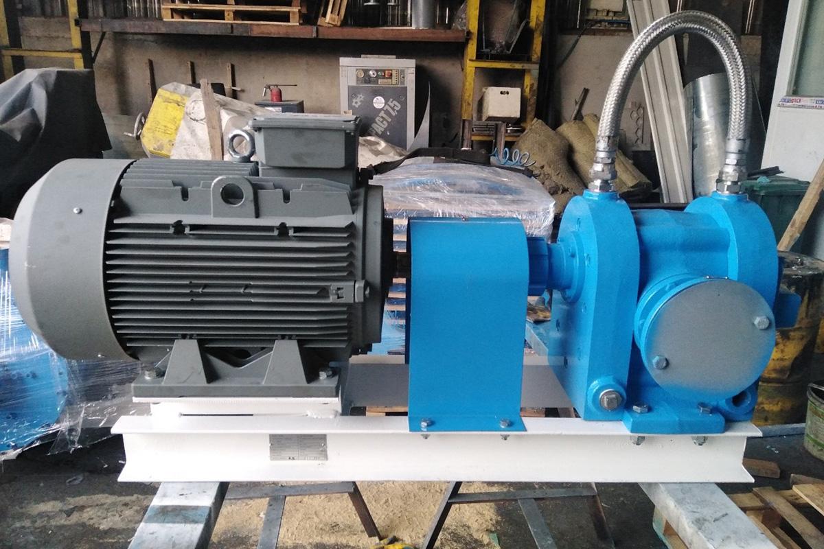 Blue bitumen pump coupled to an electric motor on a steel base frame
